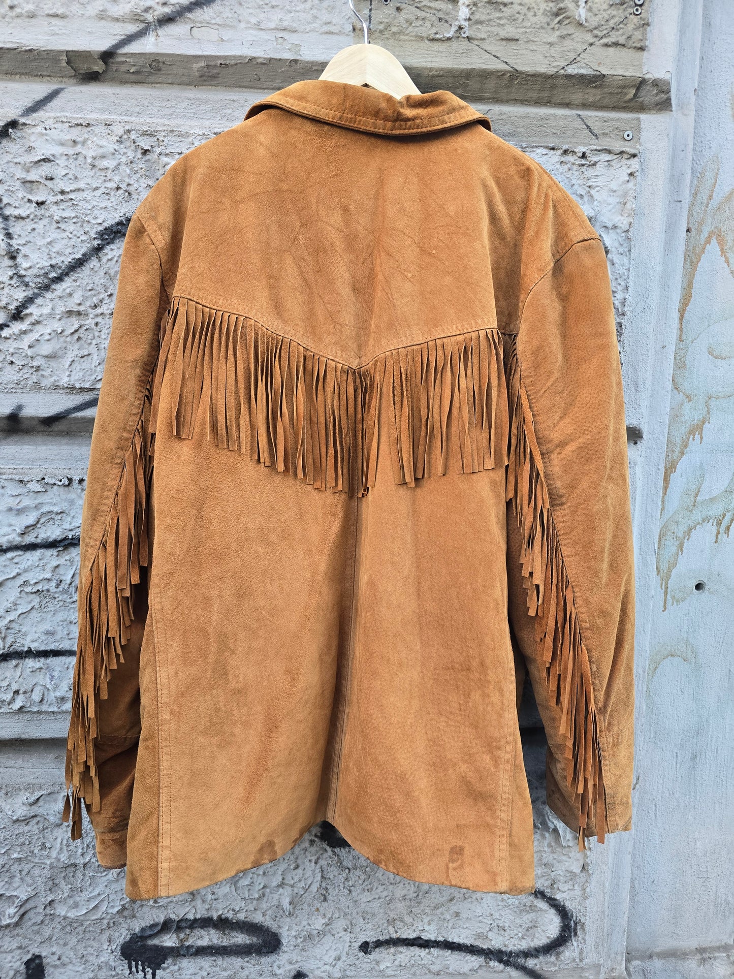 Giacca vintage in pelle scamosciata con frange