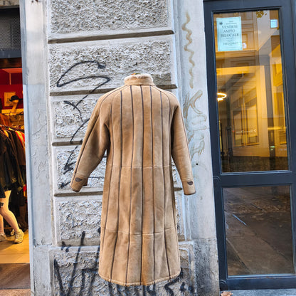 Montone vintage con rifiniture in pelle