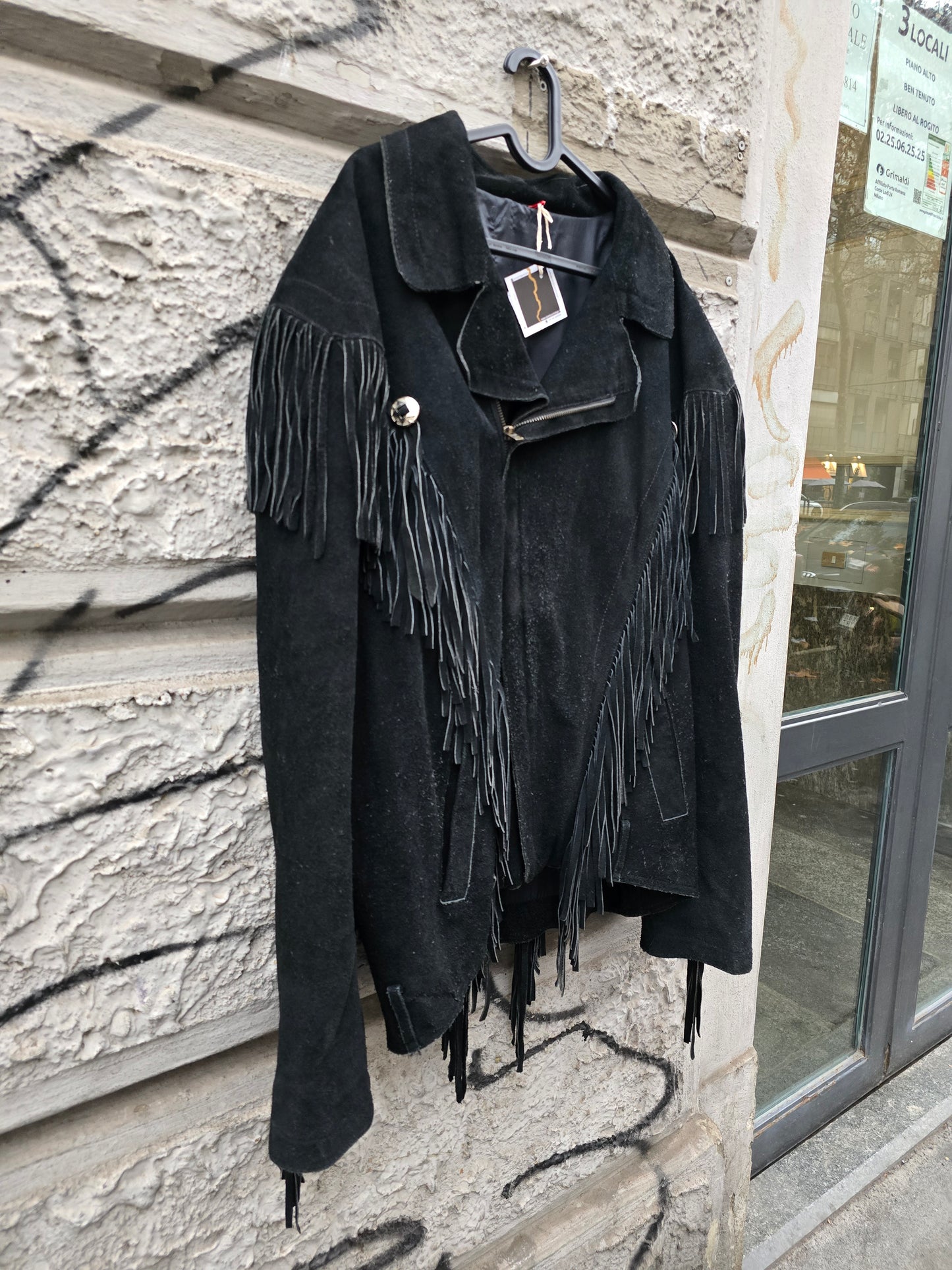 Giacca in pelle vintage frangiata