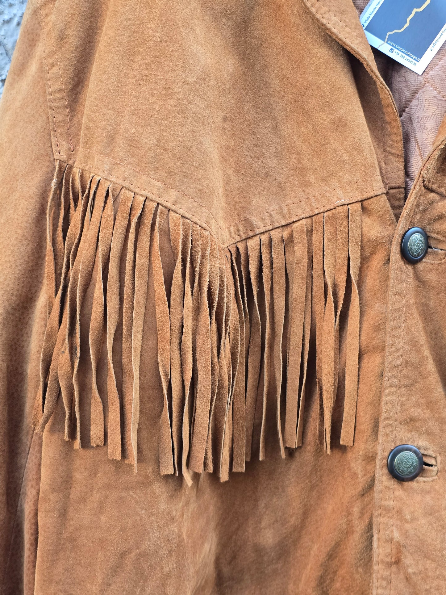 Giacca vintage in pelle scamosciata con frange