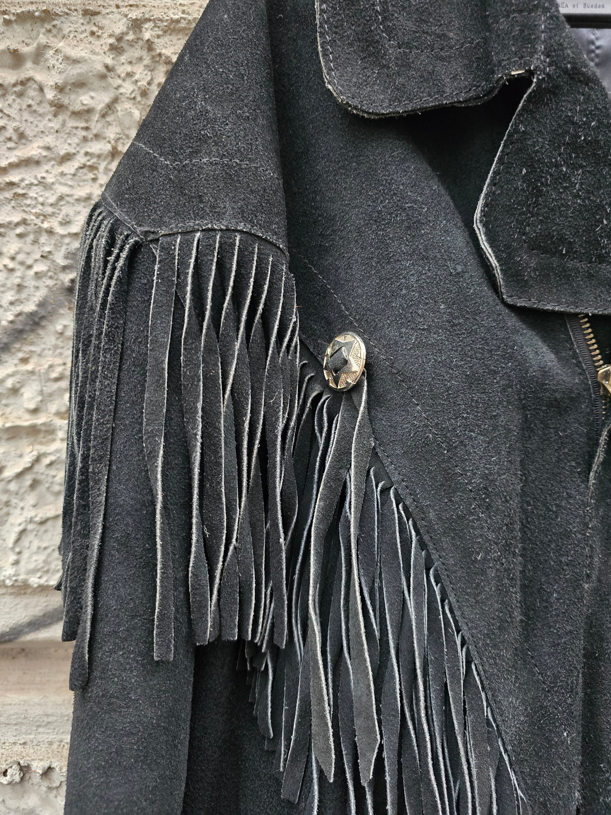 Giacca in pelle vintage frangiata